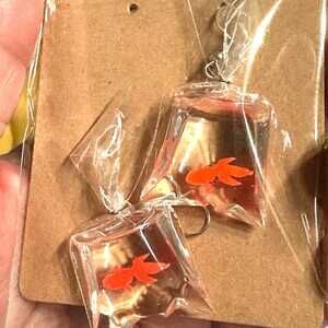 So cute dangling goldfish in a bag -